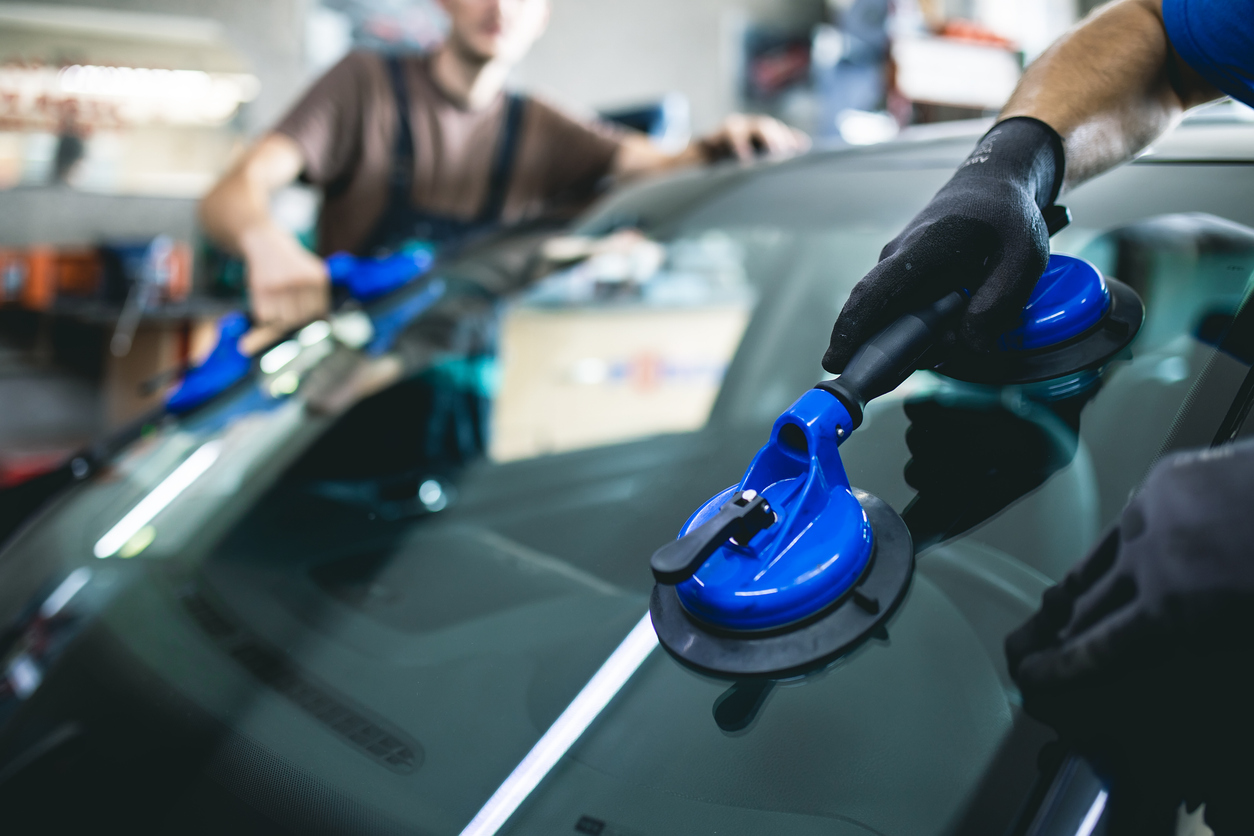 replacement of car glass in a car service.